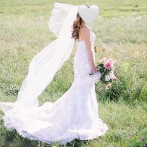 Elegant White Beaded Lace Detail Gown with Veil